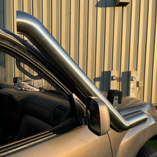 car with exposed muffler